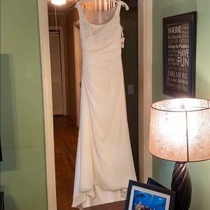 Beautiful white wedding gown with beaded back